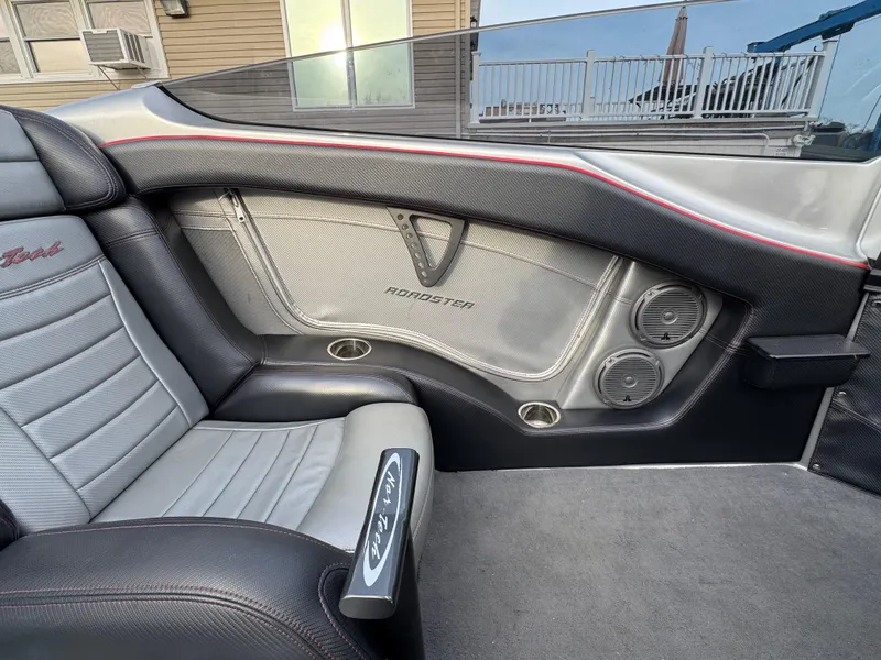 Slide: The Image of Interior of 2010 Nor-Tech 4000 Roadster, featuring sleek leather seats and modern design elements. - 30