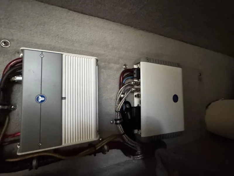 Slide: The Image of 2010 Nor-Tech 4000 Roadster interior electronics with wiring and components. - 32