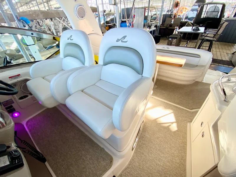 Slide: The Image of Luxurious interior of 2007 Sea Ray 340 Sundancer with plush white seating. - 14