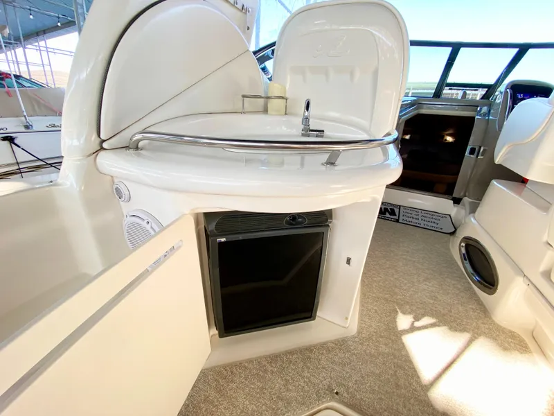 Slide: The Image of 2007 Sea Ray 340 Sundancer yacht interior with mini fridge and sink. - 16