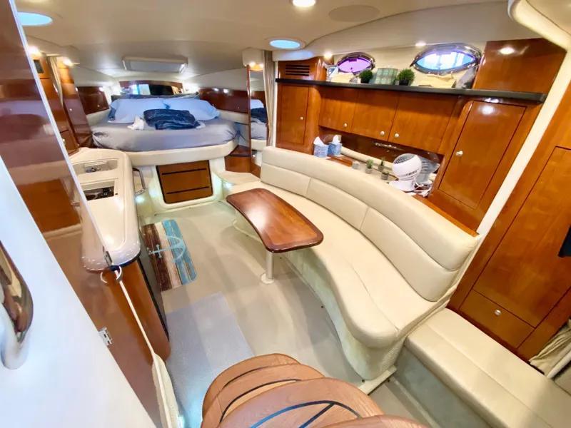 Slide: The Image of Luxurious interior of 2007 Sea Ray 340 Sundancer yacht with elegant wood finishes. - 19