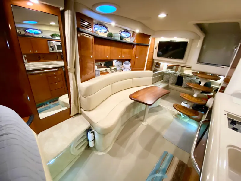 Slide: The Image of Luxurious interior of 2007 Sea Ray 340 Sundancer yacht with elegant seating and modern amenities. - 22