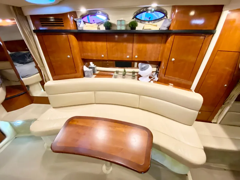 Slide: The Image of Luxurious 2007 Sea Ray 340 Sundancer cabin with elegant wood finishes and plush seating. - 27