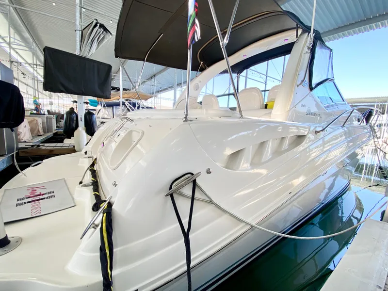 Slide: The Image of 2007 Sea Ray 340 Sundancer yacht docked in marina under cover. - 3