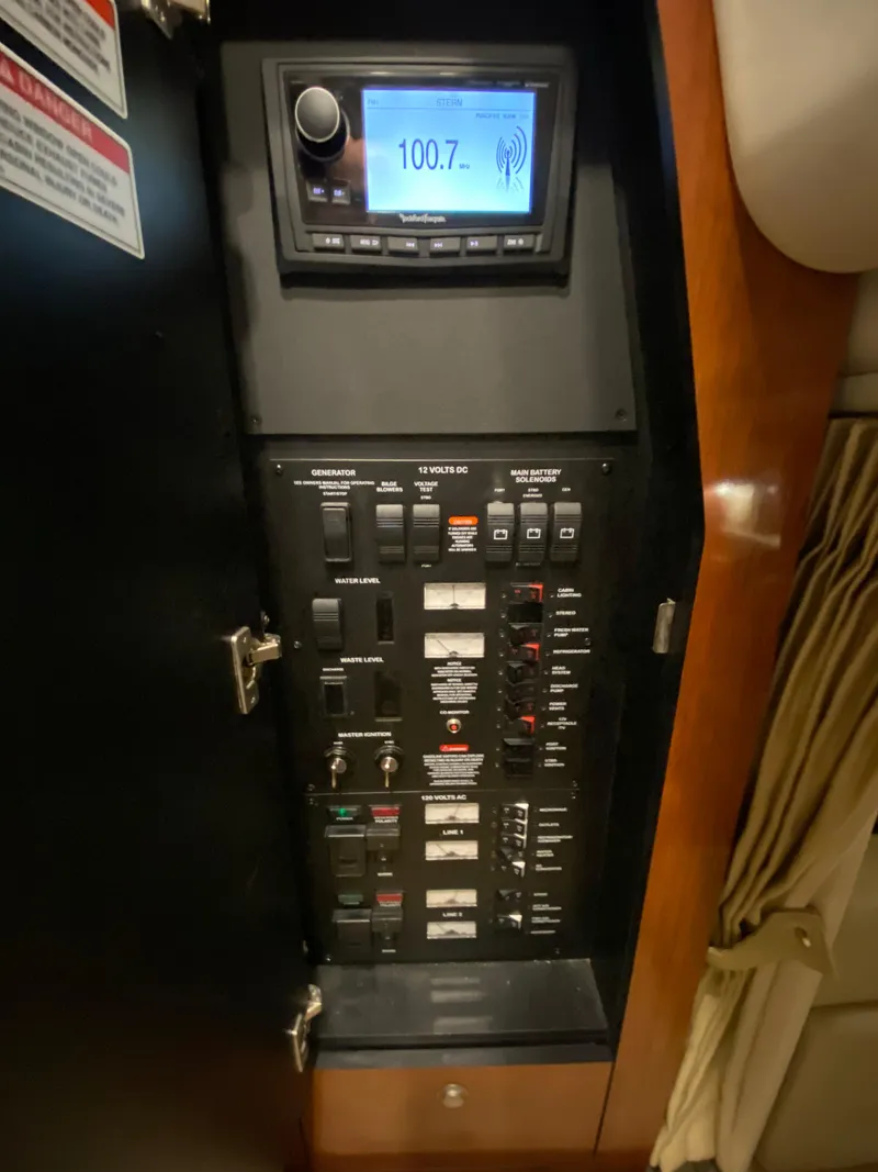 Slide: The Image of Control panel of a 2007 Sea Ray 340 Sundancer boat with radio display. - 32