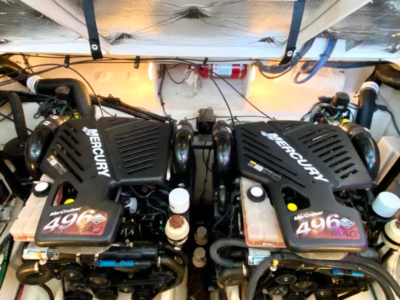 Slide: The Image of Twin Mercury engines in a 2007 Sea Ray 340 Sundancer boat. - 37