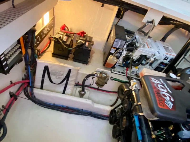 Slide: The Image of Engine room of 2007 Sea Ray 340 Sundancer with batteries and wiring. - 39