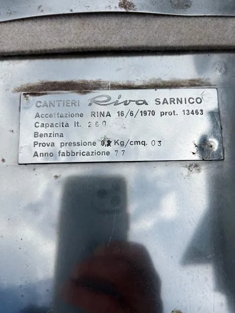 Slide: The Image of Metal plate on Riva 310 boat, 1977, showing specifications and manufacturing details. - 22