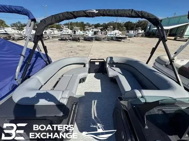 Slide: The Image of 2025 Bennington 22MSBSE pontoon boat interior with spacious seating at Boaters Exchange. - 9