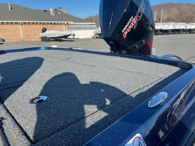 Slide: The Image of 2025 Nitro Z20 XL Pro boat with Mercury Pro XS engine, parked outdoors. - 14