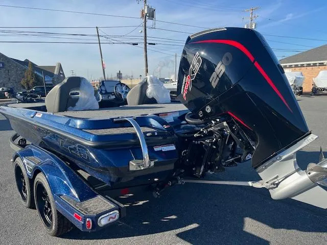 Slide: The Image of 2025 Nitro Z20 XL Pro boat with powerful engine, parked outdoors. - 5