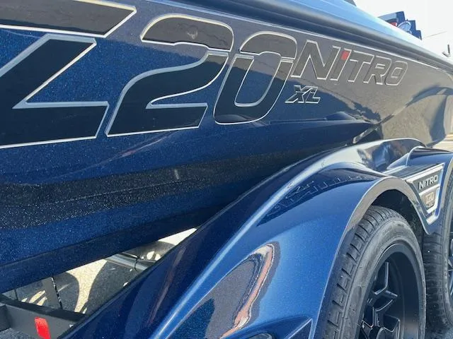 Slide: The Image of Close-up of 2025 Nitro Z20 XL Pro boat with sleek design and branding. - 7