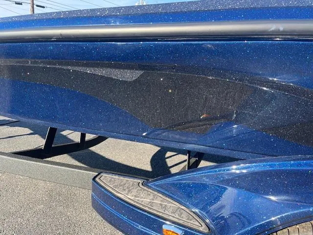 Slide: The Image of 2025 Nitro Z20 XL Pro boat with sleek blue finish and modern design. - 9