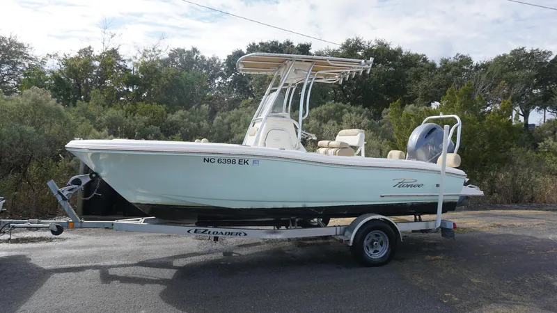 Slide: The Image of 2019 Pioneer 202 Sportfish boat on trailer, parked outdoors. - 10