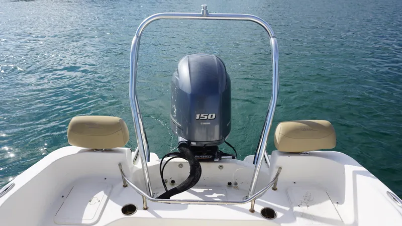 Slide: The Image of 2019 Pioneer 202 Sportfish boat with Yamaha 150 engine on calm water. - 9