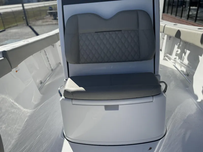 Slide: The Image of 2025 Sportsman Open 262 Center Console boat seat with cushioned backrest. - 15