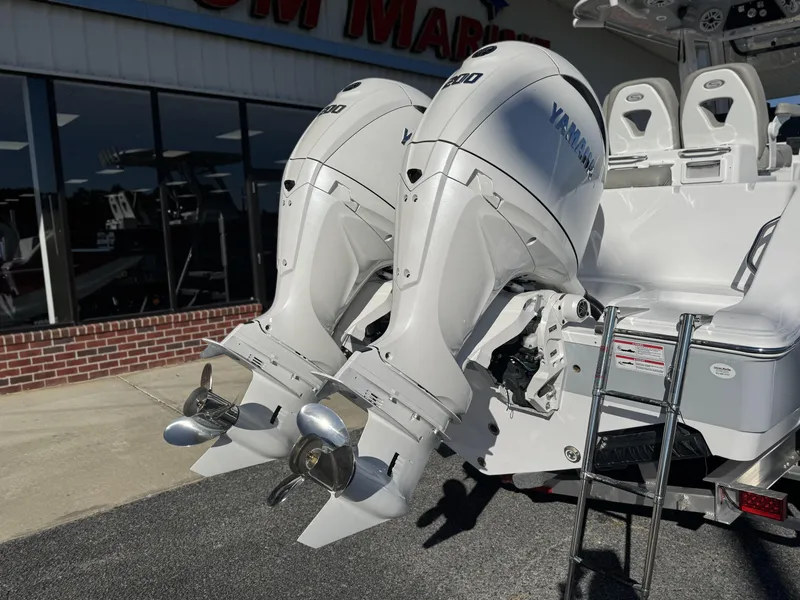 Slide: The Image of 2025 Sportsman Open 262 Center Console with twin Yamaha outboard engines. - 7