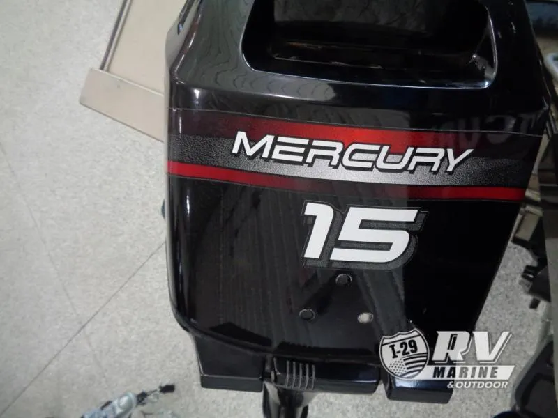 Slide: The Image of Mercury 15 outboard motor on a 1994 Lund 1775 Pro V boat. - 11