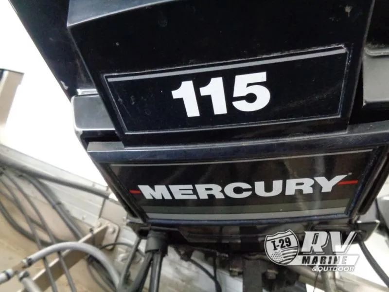 Slide: The Image of Mercury 115 outboard motor on 1994 Lund 1775 Pro V boat. - 17