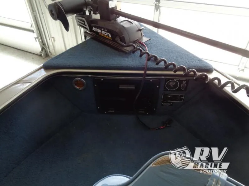 Slide: The Image of 1994 Lund 1775 Pro V boat interior with Minn Kota trolling motor. - 19