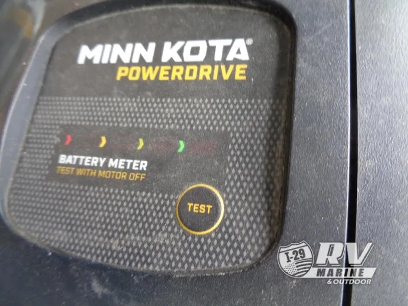 Slide: The Image of Minn Kota PowerDrive battery meter on Lund 1775 Pro V, 1994 model. - 23
