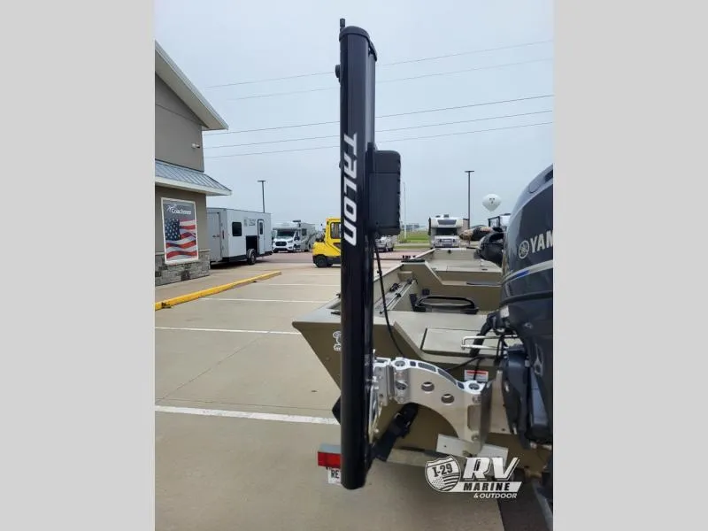 Slide: The Image of 2015 G3 1860SC DLX boat with Talon anchor system in parking lot. - 5
