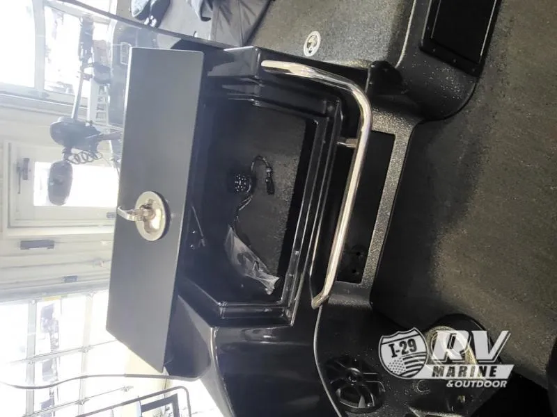 Slide: The Image of 2018 Nitro ZV21 boat interior with storage compartment and RV Marine logo. - 7