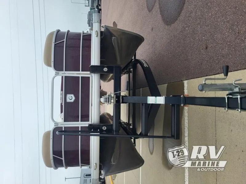 Slide: The Image of 2018 Cruisers 2086 pontoon boat on trailer at RV Marine dealership. - 12