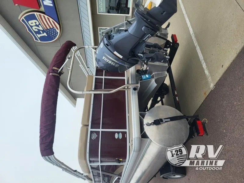 Slide: The Image of 2018 Cruisers 2086 pontoon boat with Yamaha motor at RV Marine dealership. - 2