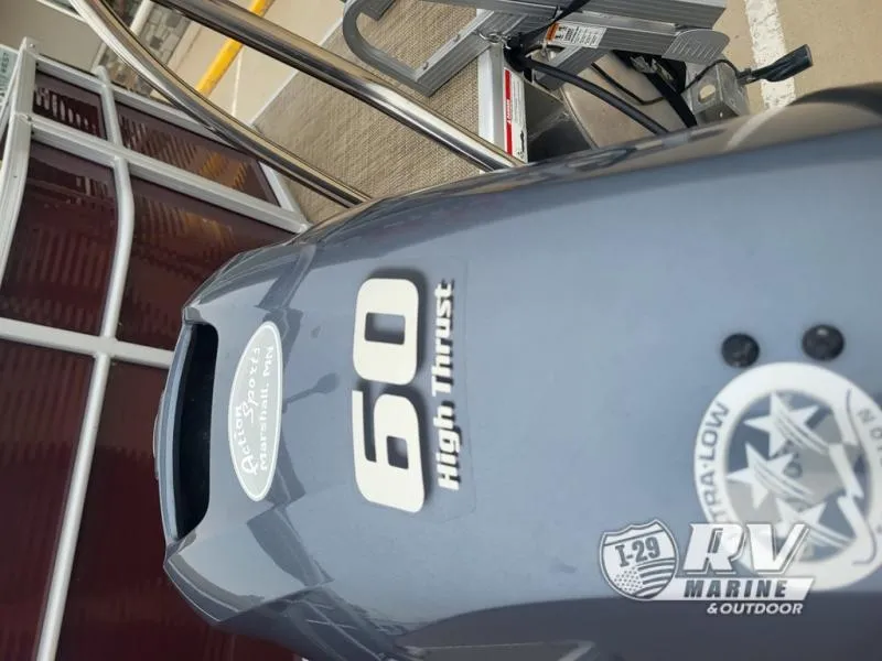 Slide: The Image of 2018 Cruisers 2086 boat with 60 High Thrust engine, RV Marine branding visible. - 3