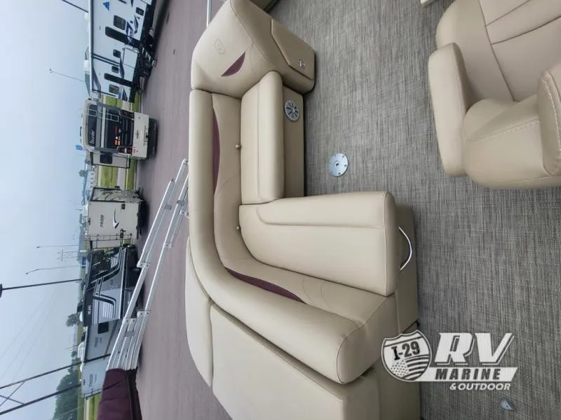 Slide: The Image of 2018 Cruisers 2086 boat interior with beige seating at RV Marine & Outdoor. - 9