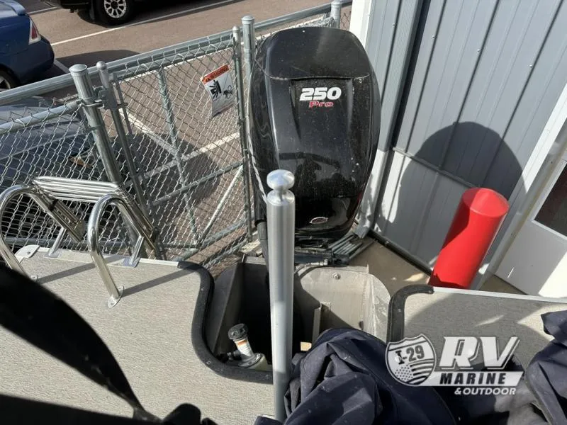 Slide: The Image of Mirage 8522 boat with 250 Pro motor, parked near RV Marine & Outdoor. - 16