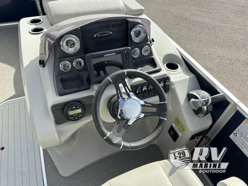 Slide: The Image of 2018 Mirage 8522 boat dashboard with steering wheel and control panel. - 17