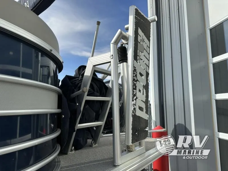 Slide: The Image of 2018 Mirage 8522 boat with ladder and RV Marine logo. - 8