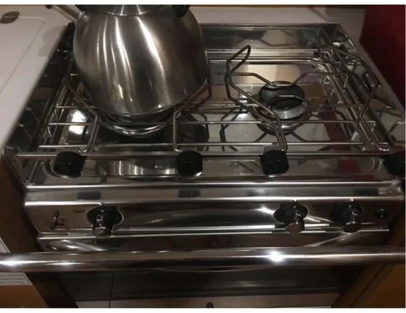 Slide: The Image of Stainless steel stove with kettle on Jeanneau Sun Odyssey 44 DS yacht, 2017 model. - 16