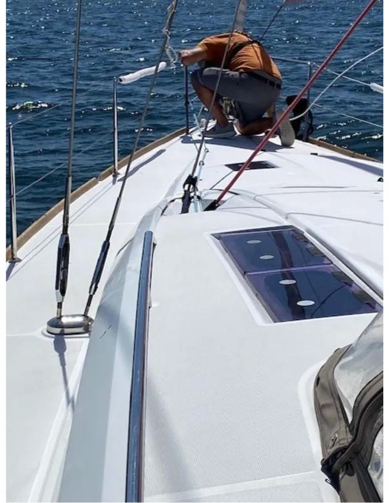 Slide: The Image of Person working on deck of 2017 Jeanneau Sun Odyssey 44 DS sailboat. - 20