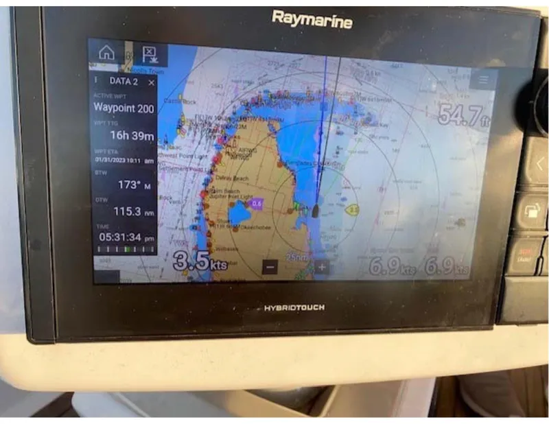 Slide: The Image of Raymarine navigation display on Jeanneau Sun Odyssey 44 DS, showing nautical chart and waypoints. - 24