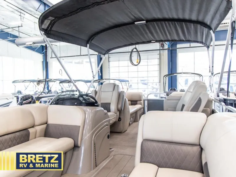Slide: The Image of 2023 Party Barge 22 RF XP3 pontoon boat interior at Bretz RV & Marine showroom. - 12