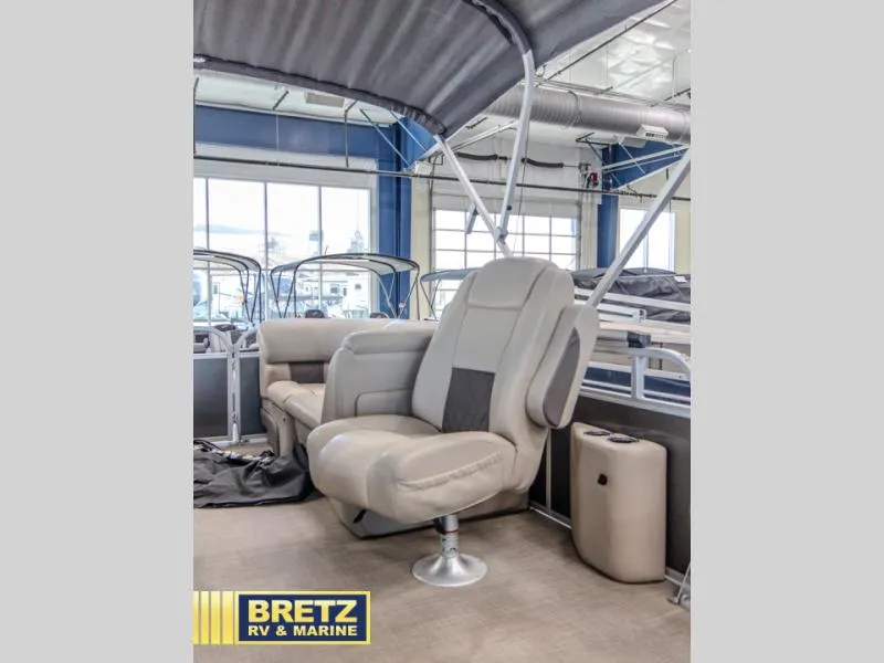Slide: The Image of 2023 Party Barge 22 RF XP3 pontoon boat interior with plush seating at Bretz RV & Marine. - 6
