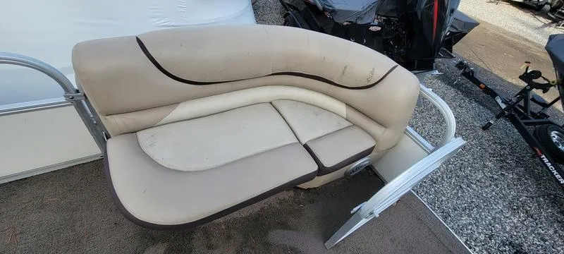 Slide: The Image of 2016 Sun Tracker PB 22 RF boat seat with beige upholstery. - 10