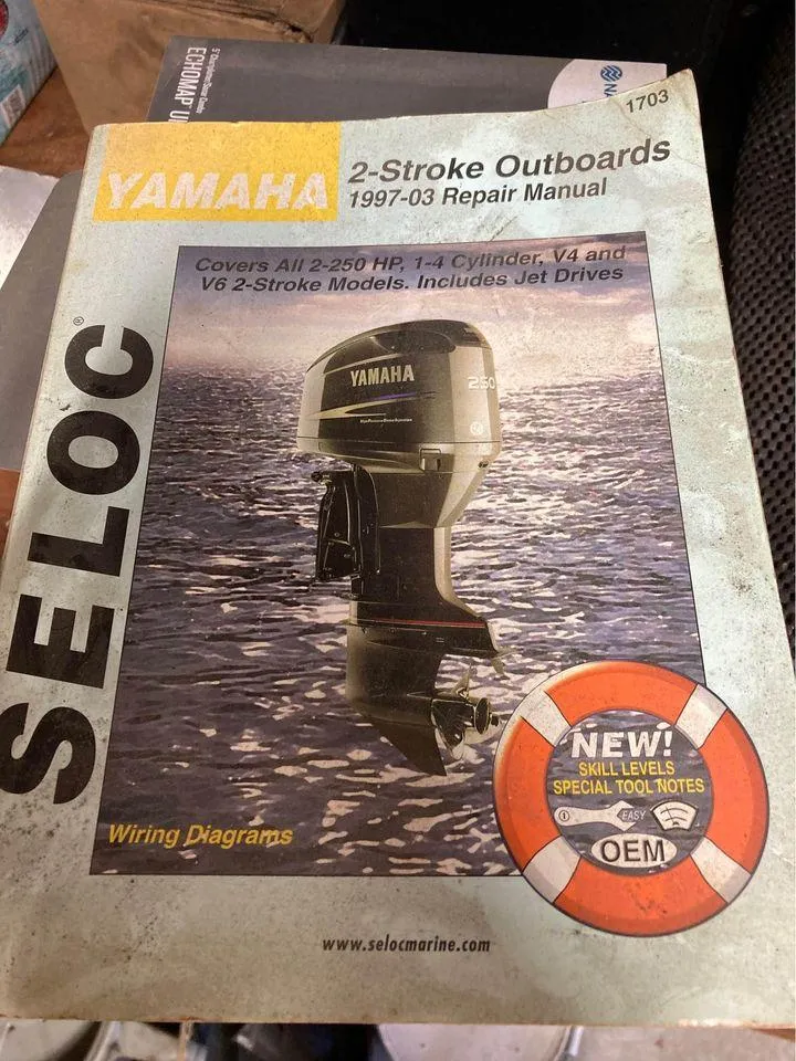 Slide: The Image of Yamaha 2-stroke outboards repair manual, 1997-2003, with wiring diagrams and special tool notes. - 3