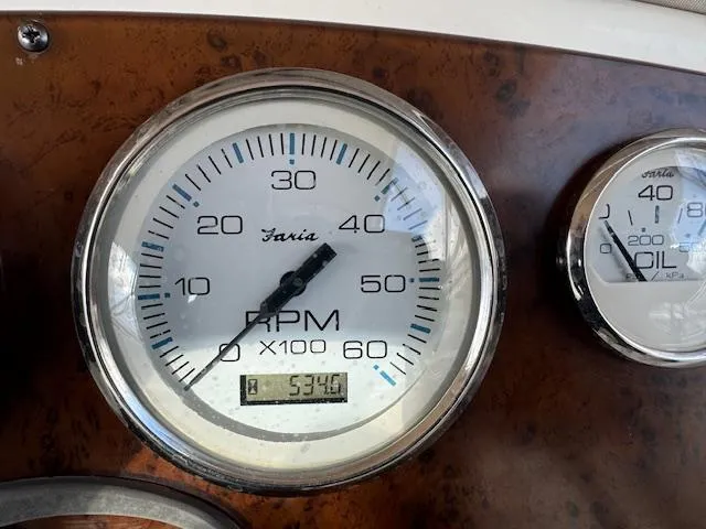 Slide: The Image of Close-up of 2002 Silverton 330 Sport Bridge RPM gauge displaying 5340 hours. - 19