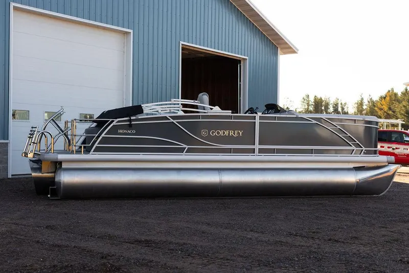 The Image of 2025 Godfrey Monaco 235 SFL pontoon boat for sale in showroom. - 0