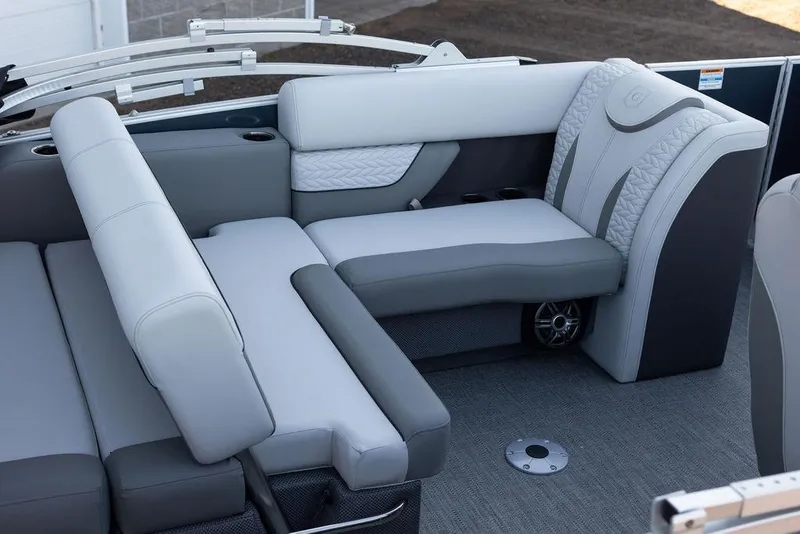 Slide: The Image of 2025 Godfrey Monaco 235 SFL boat interior with stylish gray and white seating. - 10