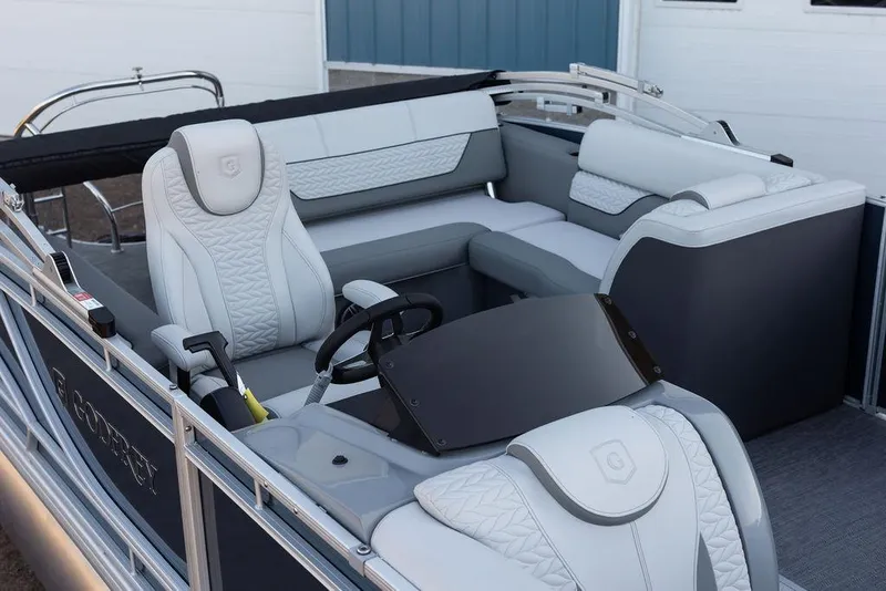 Slide: The Image of 2025 Godfrey Monaco 235 SFL pontoon boat, rear view, showcasing sleek design and sturdy construction. - 6