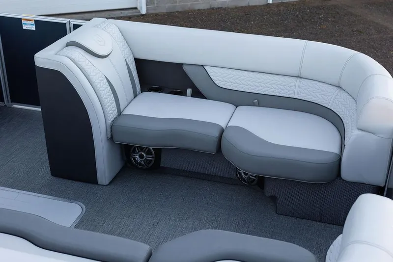 Slide: The Image of 2025 Godfrey Monaco 235 SFL pontoon boat with sleek design and modern features. - 7