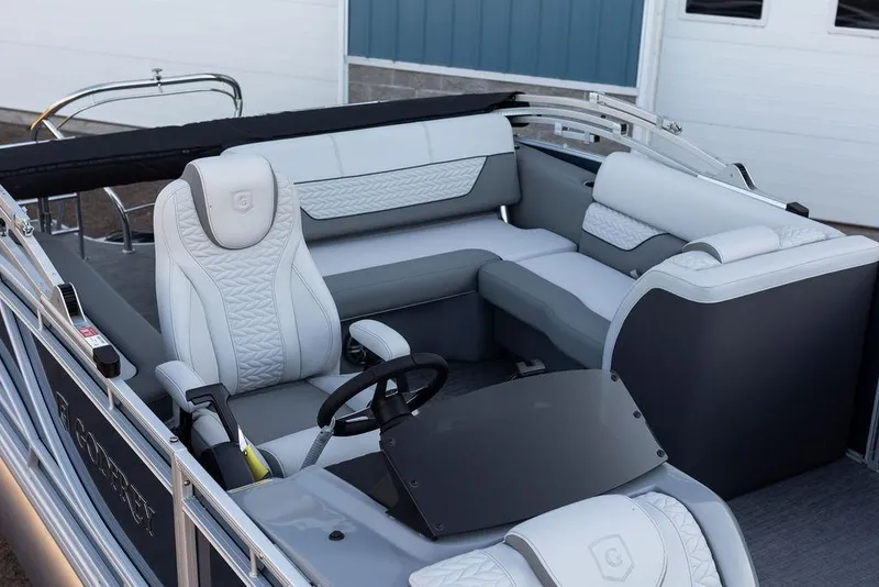 Slide: The Image of 2025 Godfrey Monaco 235 SFL pontoon boat with luxurious seating and modern design. - 8