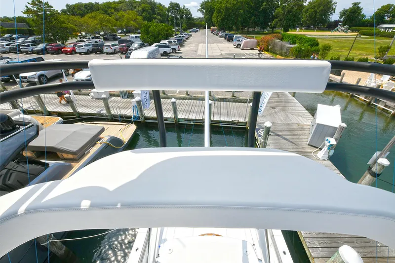Slide: The Image of 2024 Valhalla Boatworks V-55 Center Console docked at a marina, view from above. - 21