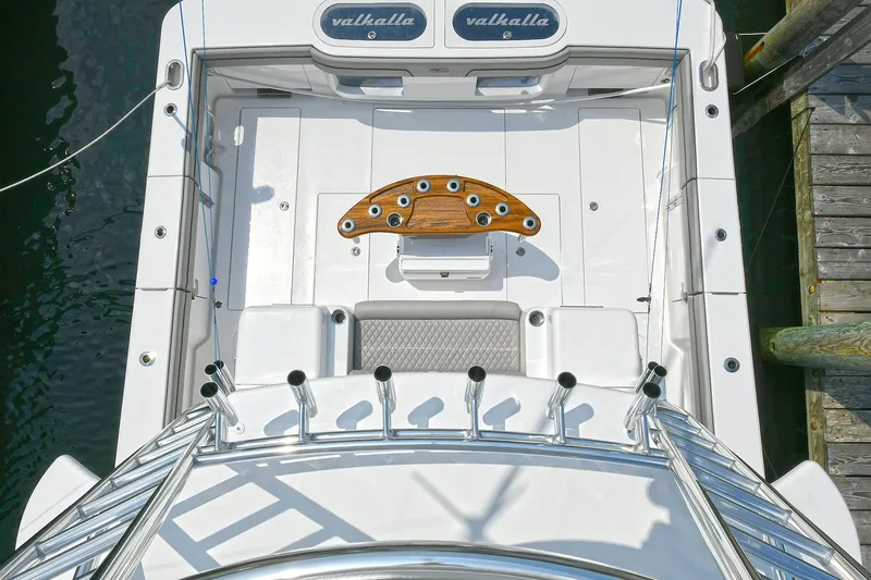 Slide: The Image of 2024 Valhalla V-55 Center Console boat, aerial view of deck and rod holders. - 25