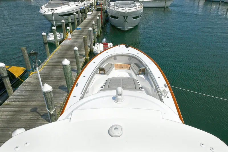 Slide: The Image of 2024 Valhalla V-55 Center Console docked at marina, aerial view. - 29